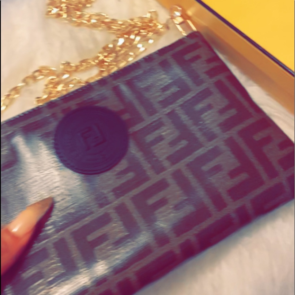 Small brown fendi clutch